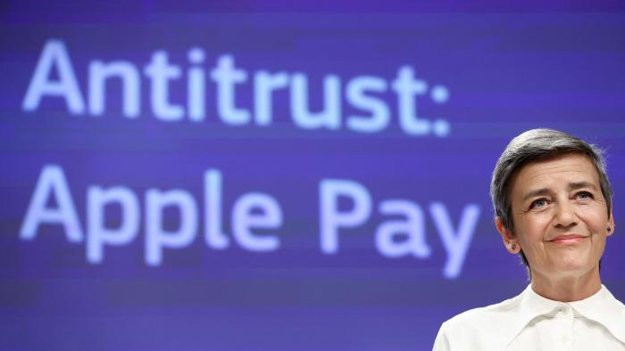 European Commission vice-president Margrethe Vestager gives a press conference on EU objections sent to Apple over practices regarding Apple Pay, at the EU headquarters in Brussels on May 2, 2022. - The EU accused Apple of blocking rivals from its popular "tap-as-you-go" iPhone payment system, opening a fresh battlefront between the US tech giant and Brussels. The European Commission, the bloc's competition watchdog, charged the iPhone maker with preventing competitors "from accessing the necessary hardware and software" for contactless payments, "to the benefit of its own solution, Apple Pay," an EU statement said. (Photo by Kenzo TRIBOUILLARD / AFP) (Photo by KENZO TRIBOUILLARD/AFP via Getty Images)