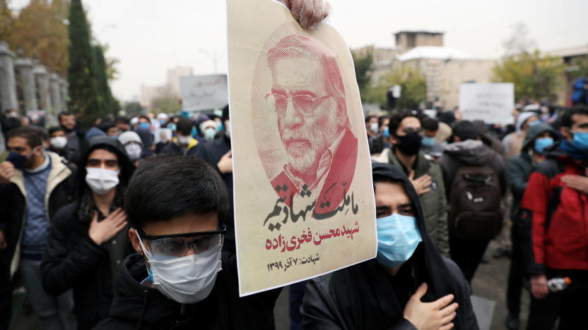 A protester holds a picture of Mohsen Fakhrizadeh, Iran's top nuclear scientist, during a demonstration against his killing in Tehran, Iran, November 28, 2020. Majid Asgaripour/WANA (West Asia News Agency) via REUTERS ATTENTION EDITORS - THIS IMAGE HAS BEEN SUPPLIED BY A THIRD PARTY.