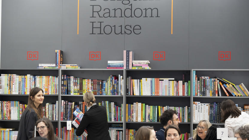 Meetings and book deals on the Penguin Random House book trade stand during the third and final day of the London Book Fair at the Olympia Exhibition Hall, on 14th March 2024, in London, England. The three-day international London Book Fair (LBF) is an annual publishing industry expo and Europe's largest spring book fair that typically attracts 25,000 visitors; exhibitors from across the publishing sector; authors hoping for their book ideas to be commissioned and where international publication rights deals are made for foreign editions. (Photo by Richard Baker / In Pictures via Getty Images)