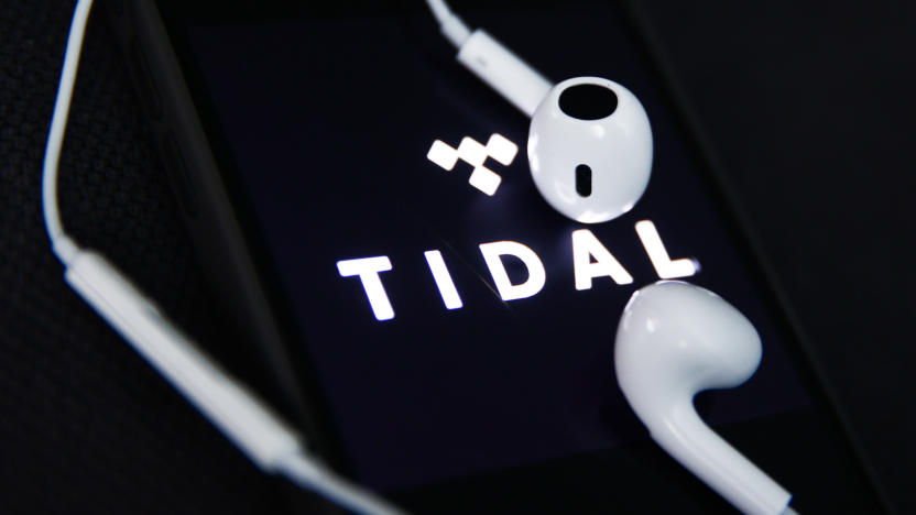 Headphones and Tidal logo displayed on a phone screen are seen in this illustration photo taken in Krakow, Poland on December 5, 2023. (Photo by Jakub Porzycki/NurPhoto via Getty Images)