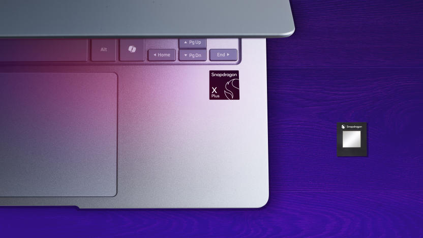 Marketing image of a laptop (top-down view) with a chip next to it. Purple-ish gradient background.