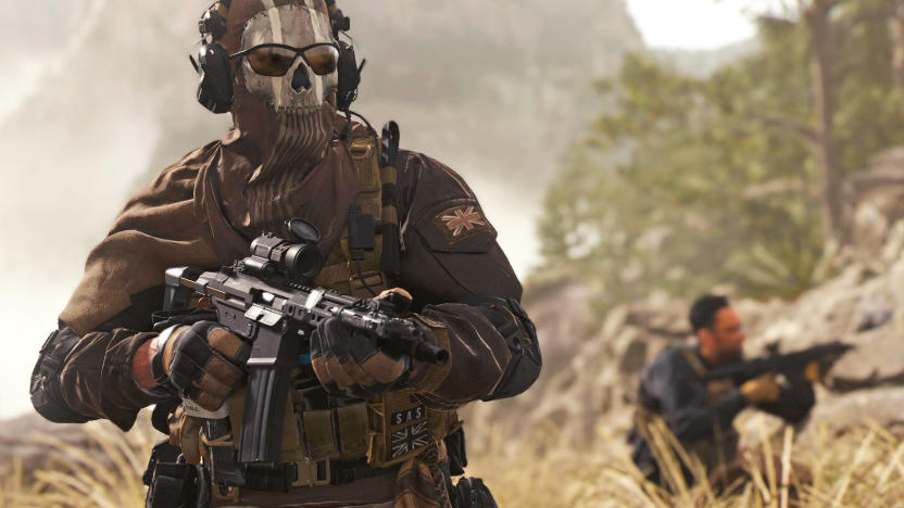 A still image from 'Call of Duty: Modern Warfare 2' showing two soldiers in tall grass. One wears a skull mask and sunglasses as he heads toward the camera with a gun raised.