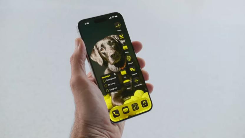 An iPhone with yellow app icons