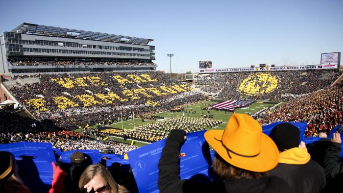 IOWA CITY, IA - NOVEMBER 01:  Fans in attendance to watch the Iowa Hawkeyes match-up against the Northwestern Wildcats perform a card stunt on November 1, 2014 at Kinnick Stadium in Iowa City, Iowa.  (Photo by Matthew Holst/Getty Images)